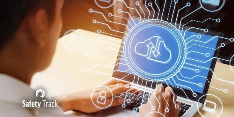 Person using a laptop with digital cloud icons and data connections.